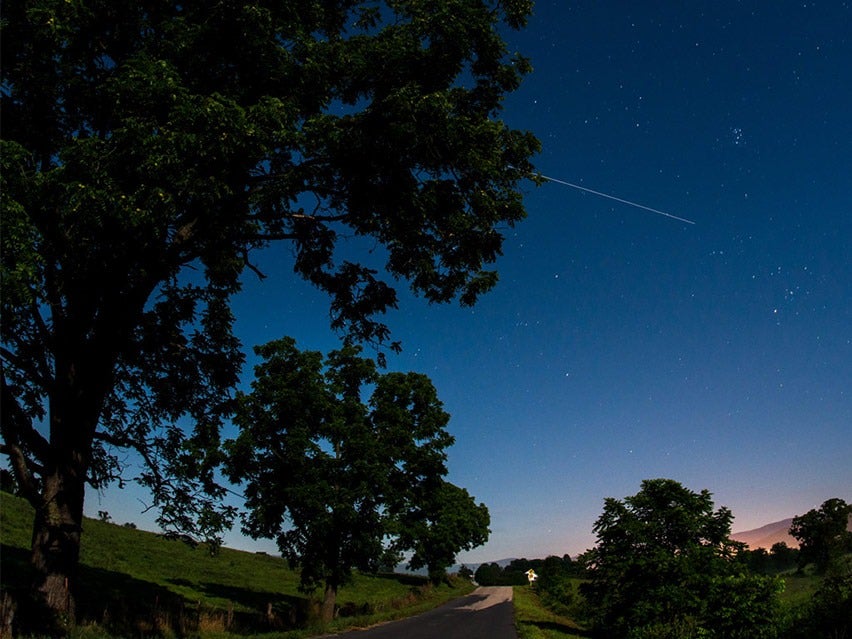 The International Space Station is seen in this 30 second exposure as it flies over Virginia in 2015. Credit: NASA/Bill Ingalls.