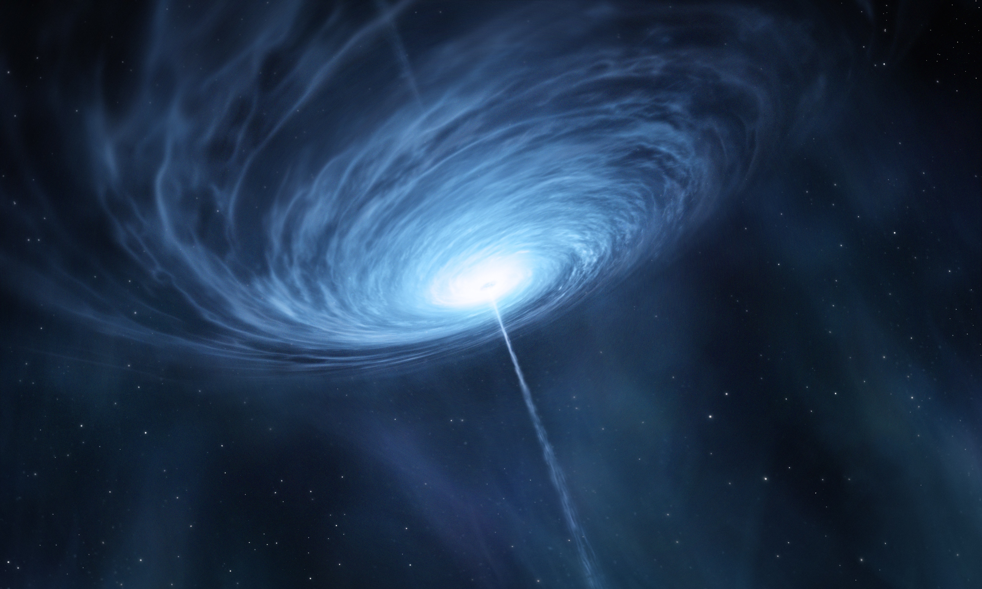 This is an artist’s impression of the quasar 3C 279. Astronomers connected the Atacama Pathfinder Experiment (APEX), in Chile, to the Submillimeter Array (SMA) in Hawaii, USA, and the Submillimeter Telescope (SMT) in Arizona, USA for the first time, to make the sharpest observations ever, of the centre of a distant galaxy, the bright quasar 3C 279. Quasars are the very bright centres of distant galaxies that are powered by supermassive black holes. This quasar contains a black hole with a mass about one billion times that of the Sun, and is so far from Earth that its light has taken more than 5 billion years to reach us.