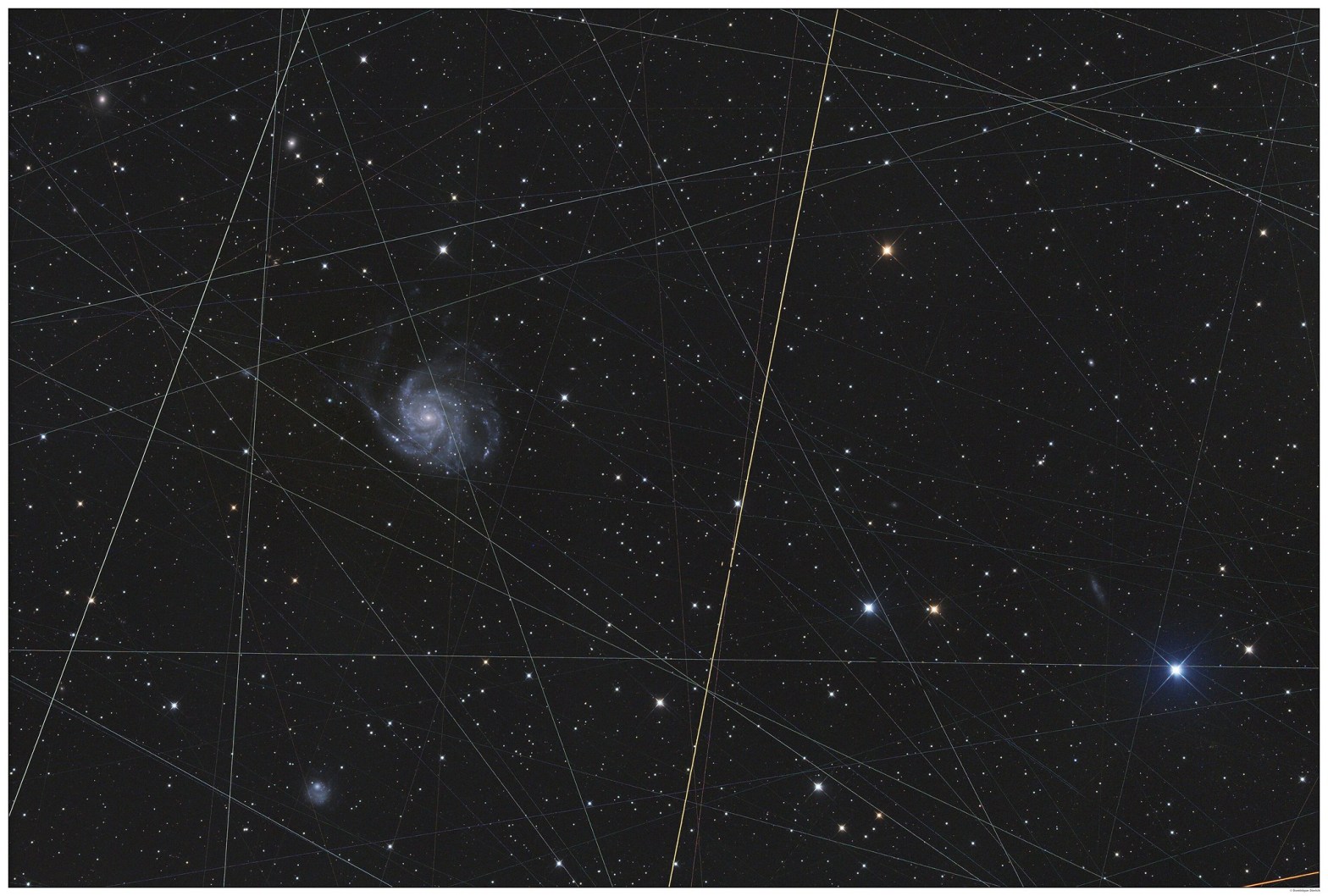 Satellite trails near Earth.