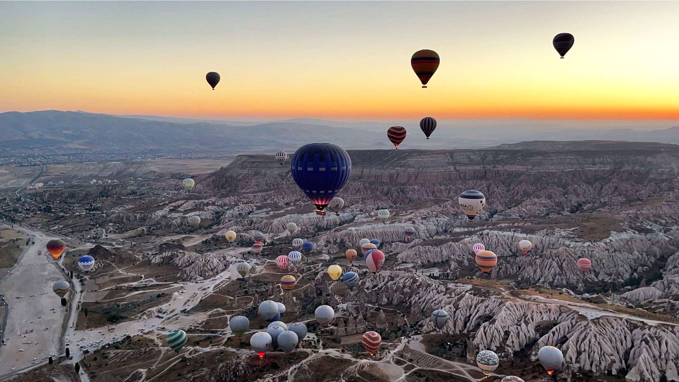 My unforgettable bird’s-eye view from Cappadocia Voyager Balloons: I could see the colorful fairy chimneys, hills, and valleys with the most stunning, vibrant backdrop.