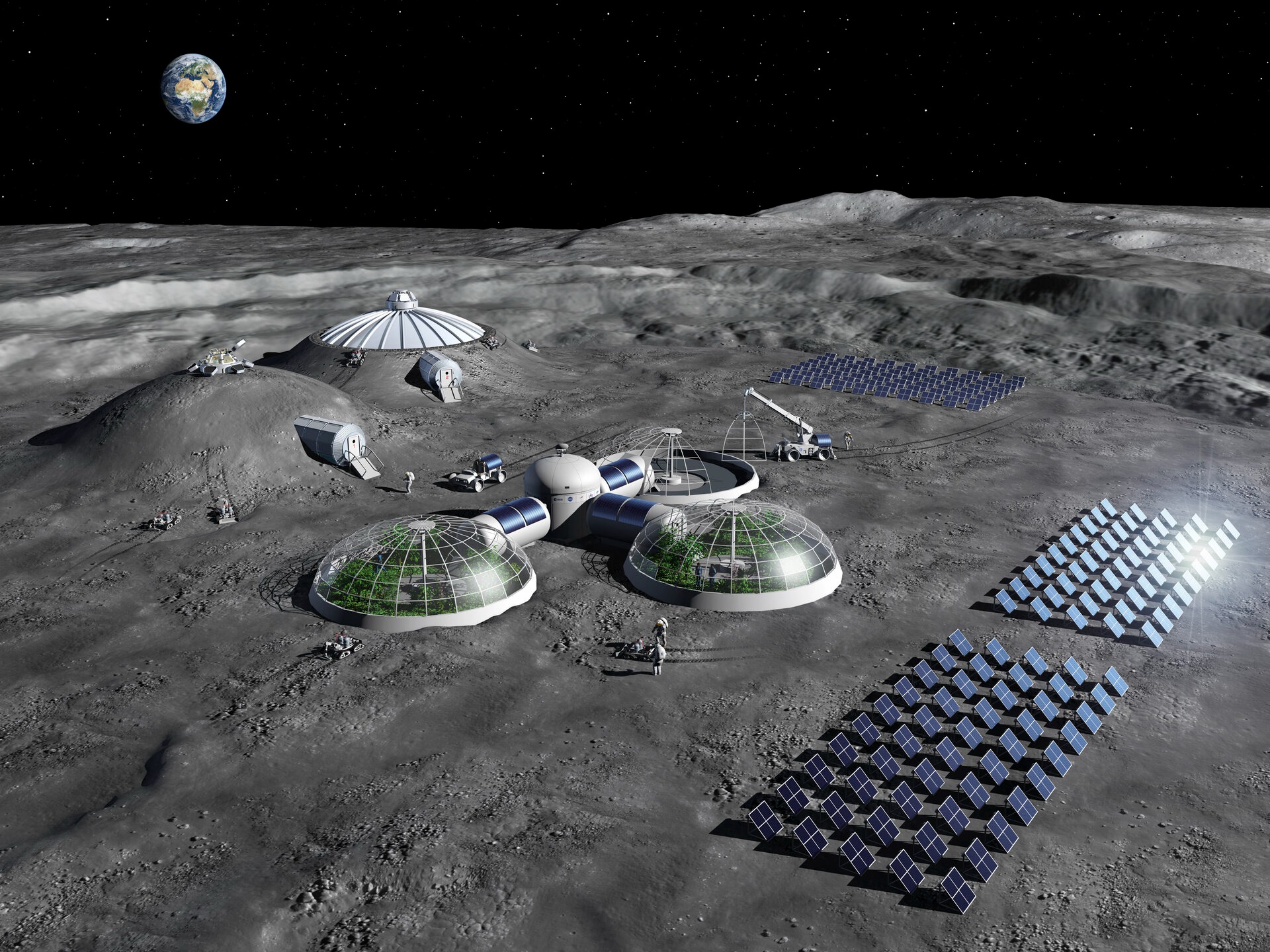 This artist impression of a Moon base shows olar arrays for energy generation, greenhouses for food production, and habitats shielded with regolith. Credit ESA.
