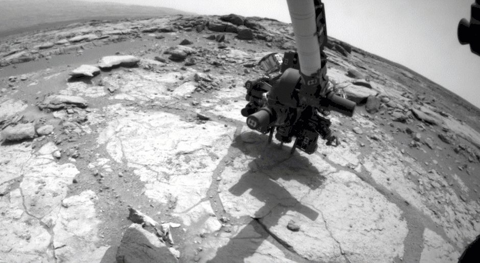 Curiosity drills one of the first holes on Mars at the site named Cumberland on May 19, 2013.