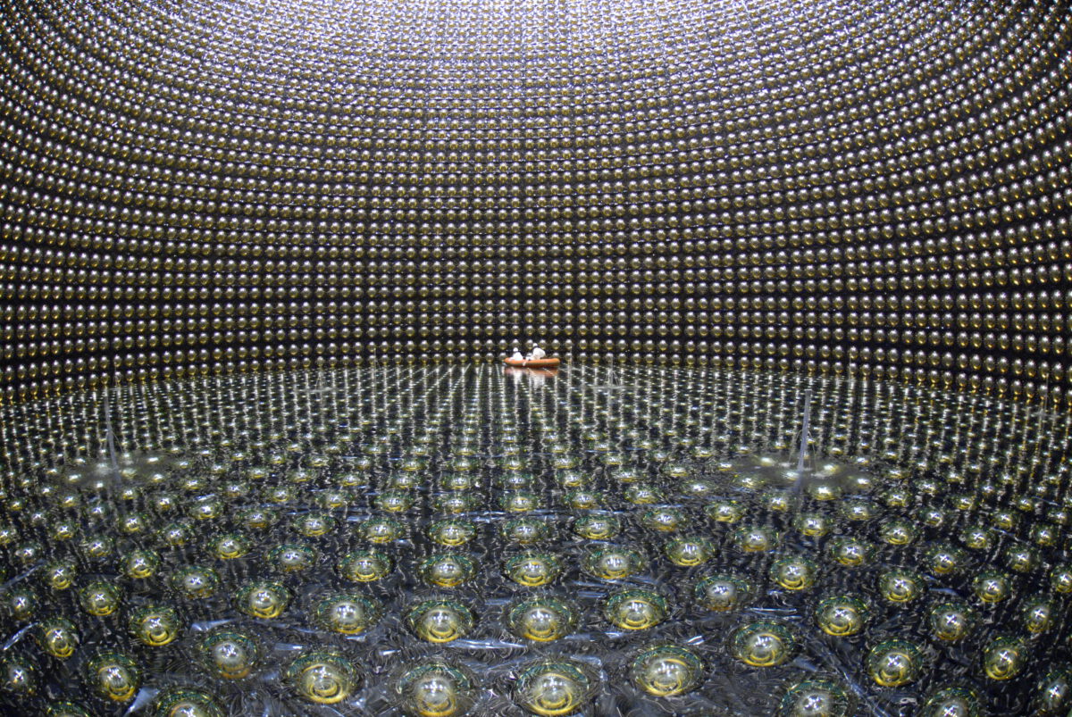 Japan’s Super-Kamiokande Observatory consists of some 13,000 photodetectors in a water-filled tank 129 feet (39.3 m) wide by 136 feet (41.4 m) tall located nearly 3,300 feet (1,000 m) underground. When a neutrino interacts with the atoms in the water, it creates a brief flash of light, called Cherenkov radiation, that is picked up by the detectors. Here, the tank is being refilled with water in April 2006.