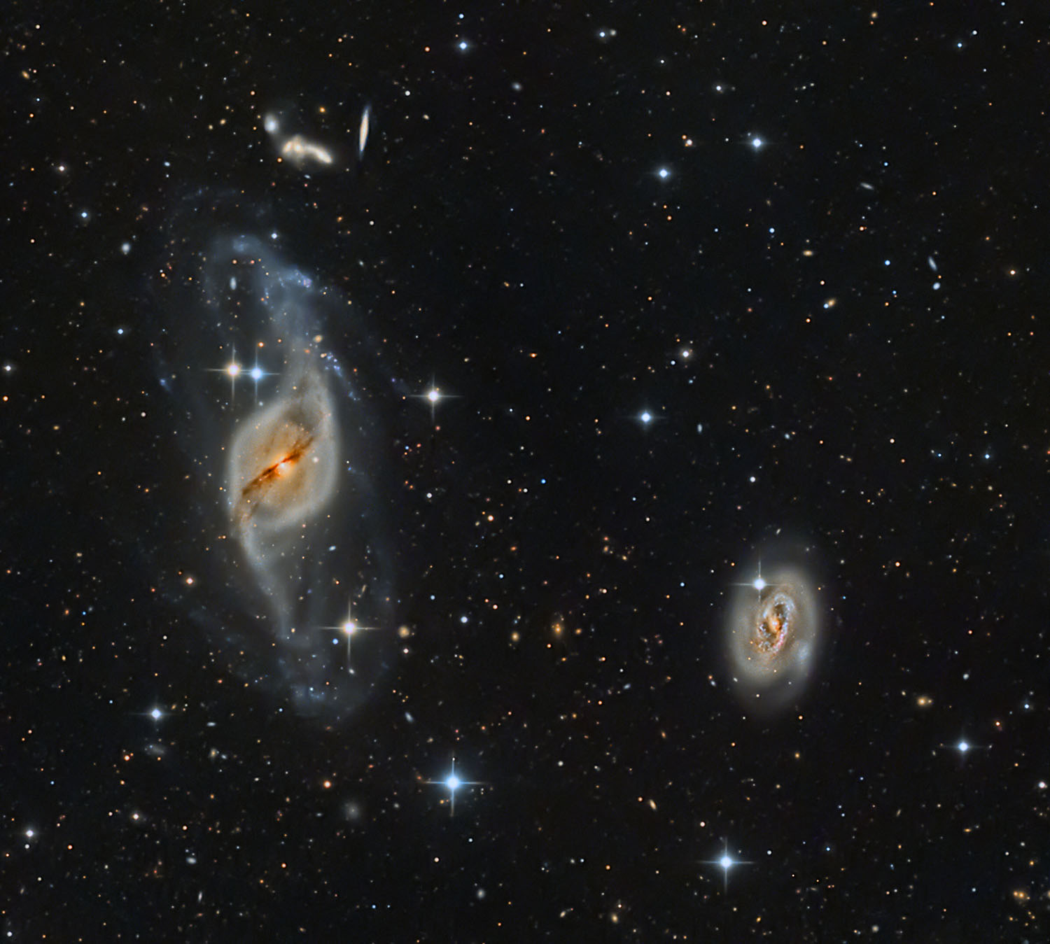 https://www.astronomy.com/wp-content/uploads/2025/07/NGC_3718_with_NGC_3729-Credit-SAFIY14.jpg
