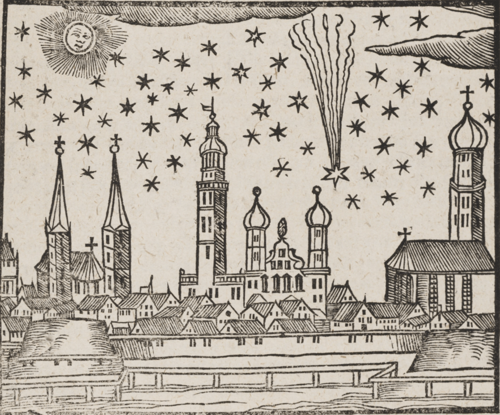 A black-and-white woodcut illustration depicts a cityscape with spires, domed towers, and gabled roofs along the bottom half of the frame. Above the town, a light-colored sky is filled with numerous black four- and five-pointed star shapes, a smiling sun face in the upper-left corner, and a star with a tall, vertical wavy trail on the right. Simple cross-hatch shading creates texture across the buildings, clouds, and wooden fence structure in the foreground.