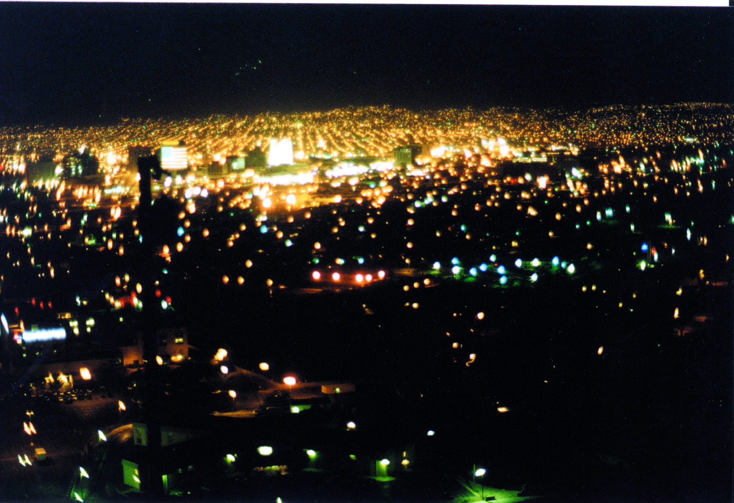 Aerial view of city lights and light pollution at night