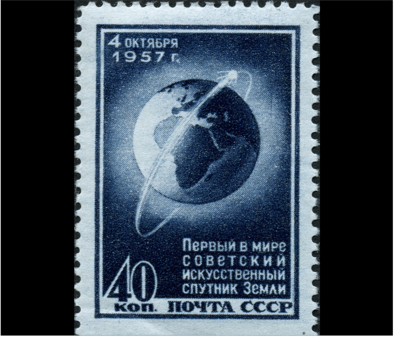 A vertical blue-and-white postage stamp with perforated edges features a dark blue central illustration of the Earth encircled by an elliptical orbital line. A small, glowing white dot with a straight trail travels along the orbital path toward the upper right corner. White Cyrillic text appears in the top-left corner, and larger text with the number "40" sits in the bottom section inside a dark rectangular border.