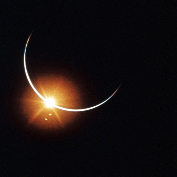 The astronauts of Apollo 12 — Alan Bean, Pete Conrad, and Dick Gordon — experienced a solar eclipse while returning home from the Moon. Their spacecraft flew through Earth’s shadow, allowing them to capture this image on their 16mm motion picture camera. Credit: NASA/JSC.