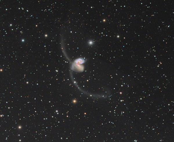 The Antennae (NGC 4038 [top] and NGC 4039) is a pair of interacting galaxies in the constellation Corvus the Crow. 