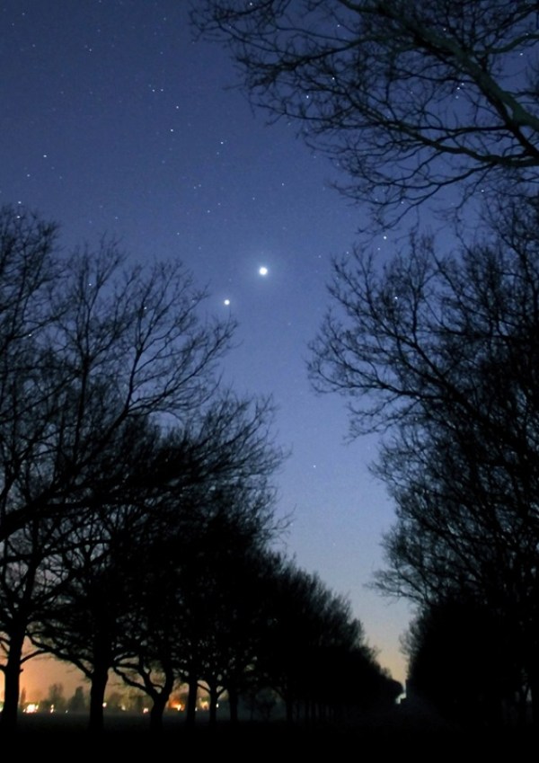 Brilliant Venus passed to the upper right of Jupiter after sunset.