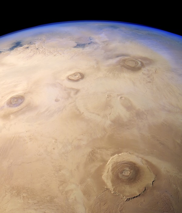 Four massive volcanoes make up the Tharsis Bulge on Mars. The largest of the four, Olympus Mons, is at bottom right. ESA/DLR/FU Berlin/Justin Cowart