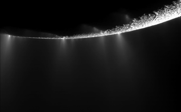 Plumes of water ice can be seen spraying near the south pole Enceladus. More than 30 jets of different sizes were captured in this image taken as the Cassini spacecraft flew through the jets on Nov. 21, 2009. Credit: NASA/JPL/Space Science Institute. Credit: NASA/JPL-Caltech.