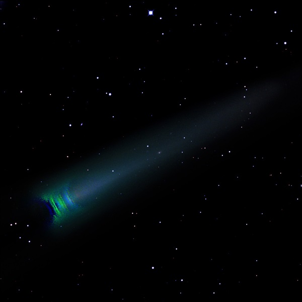 Faded comet with stars