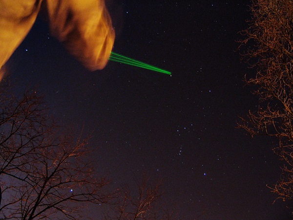 A green laser pointer can be a great observing tool as long as we use it responsibly.