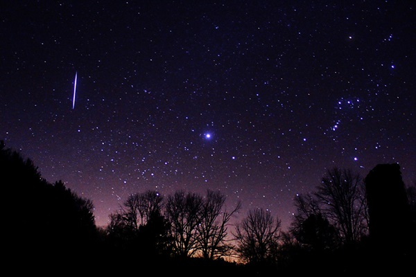 A Leonid meteor blazes across the November sky east of Orion and Sirius in this view from the peak of the 2012 shower.