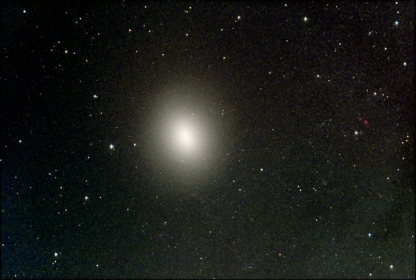M32 is either the best-known satellite of the Andromeda Galalxy (M31) or a normal galaxy three times as far away.