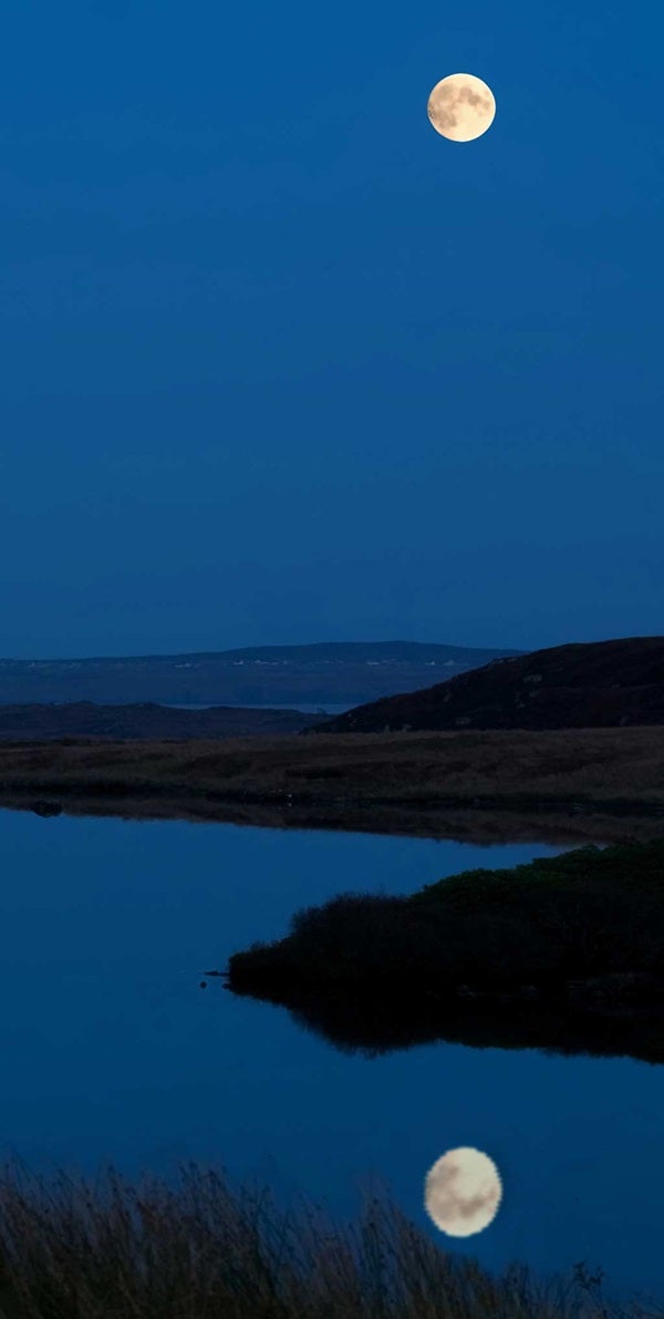 Moon over still water