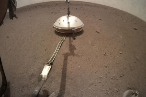 NASA___s_InSight_lander_has_its_seismic_instrument_tucked_under_a_shield_to_protect_it_from_wind_and_extreme_temperatures.__