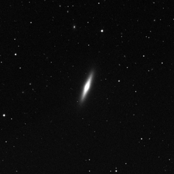 Observers hunting for comets often mistake a distant galaxy for a solar system ice ball. NGC 4570 in Virgo makes a particularly good look-alike.