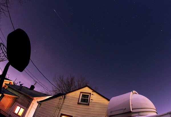 An observer in Ohio catches a Quadrantid meteor in 2012.