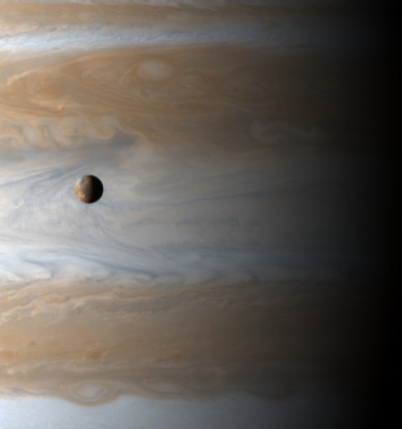 Io Floats Above Jupiter's Clouds