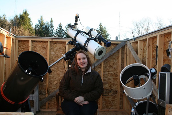 Caroline Moore in her family’s backyard Deer Pond Observatory