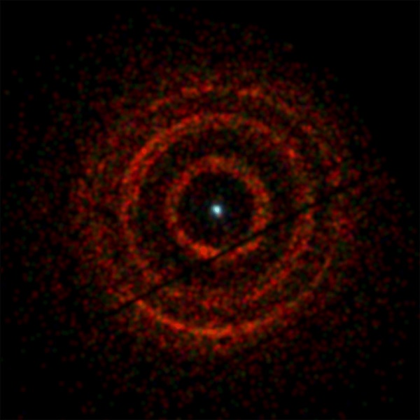 Rings of X-ray light centered on V404 Cygni, a binary system containing an erupting black hole (dot at center), were imaged by the X-ray Telescope aboard NASA's Swift satellite from June 30 to July 4.