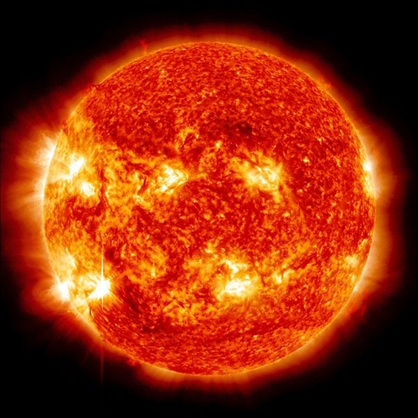 The Sun Was Dimmer When Earth Formed. How Did Life Emerge