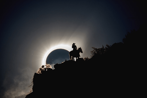 Cowboy Nicolas Silva enjoys his view of the total solar eclipse on July 2, 2019, from atop a mountain ridge near Cabalgatas Altos de Cochiguaz, a ranch in Chile’s Elqui Valley. This is the kind of photo you can get when you prepare for the total solar eclipse. Credit: Rick Armstrong