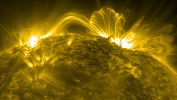 Coronal loops appear on the limb of the Sun in this image captured by the Solar Dynamics Observatory July 12, 2012.