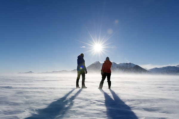 Observers in Antarctica watching the Sun