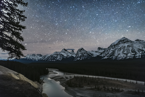 Constellations over the  Athabasca River in Alberta, Canada