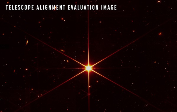 JWAST alignment image of a star with faint background galaxies