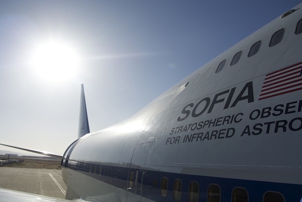 The SOFIA aircraft, lit by the Sun