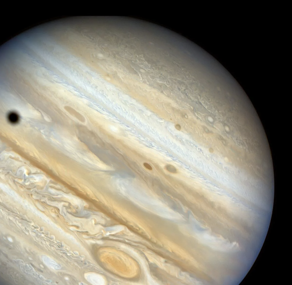 Voyager 2 image of a Callisto shadow transit on Jupiter