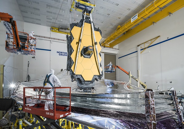 After deploying its sunshield, the James Webb Space Telescope currently looks something like this, the wings of its primary mirror still folded back. This picture was taken during final deployment tests at Northrop Grumman in Redondo Beach, California.