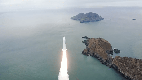 A solid-fuel rocket launches from off the South Korean coast.