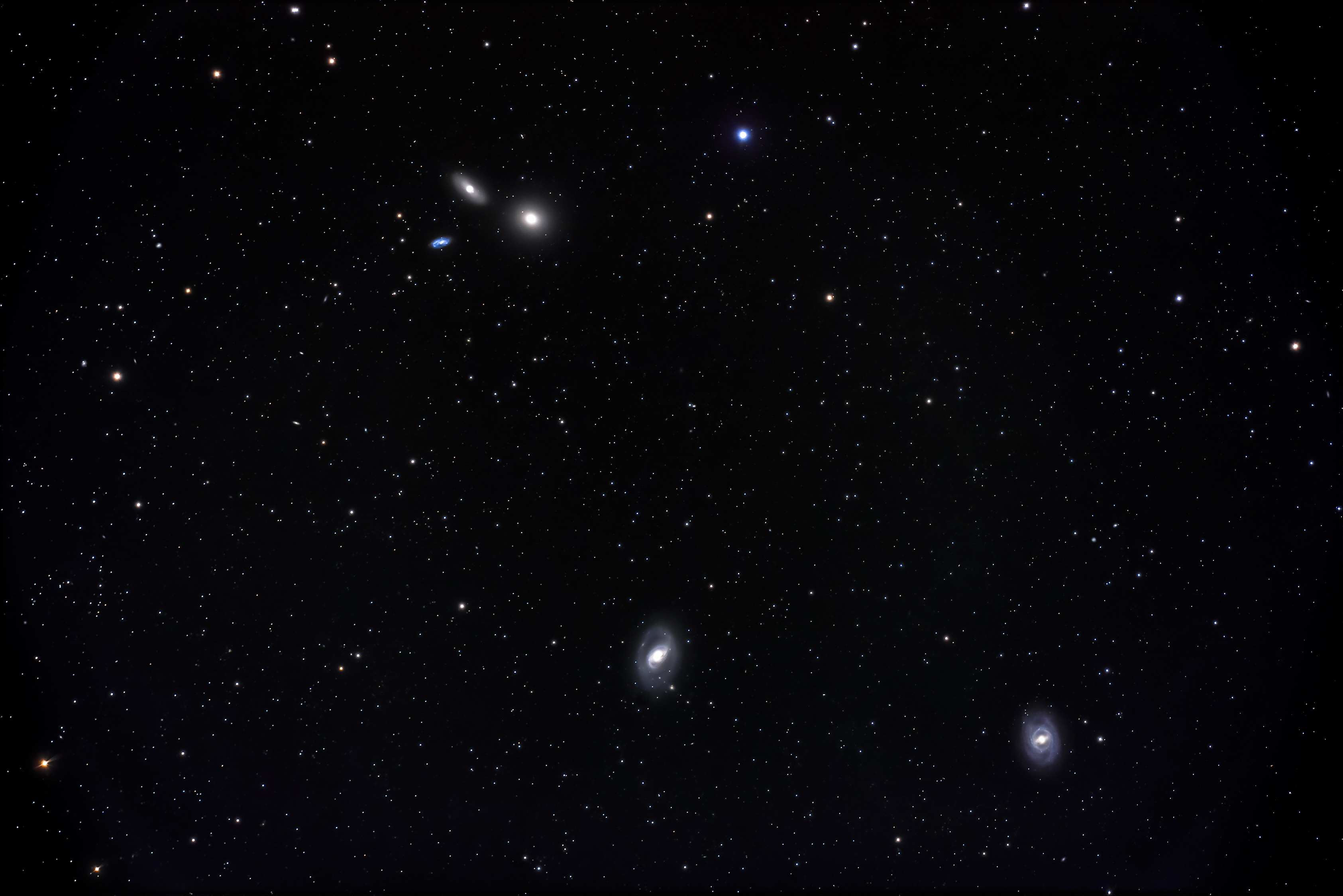 M105, NGC 3384, and NGC 3389.