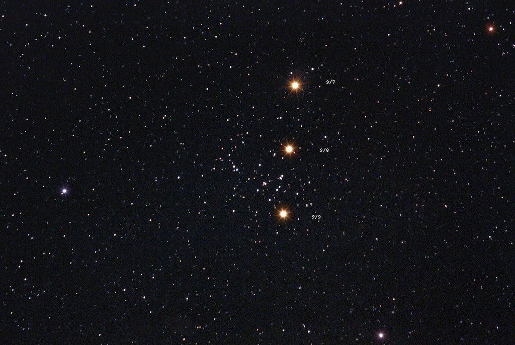 Mars crosses the Beehive Cluster