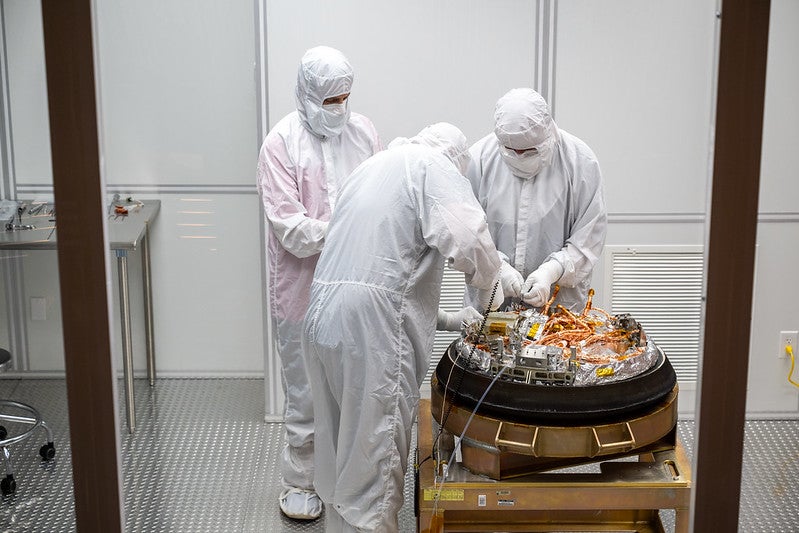 Clean room staff processing OSIRIS-REx sample