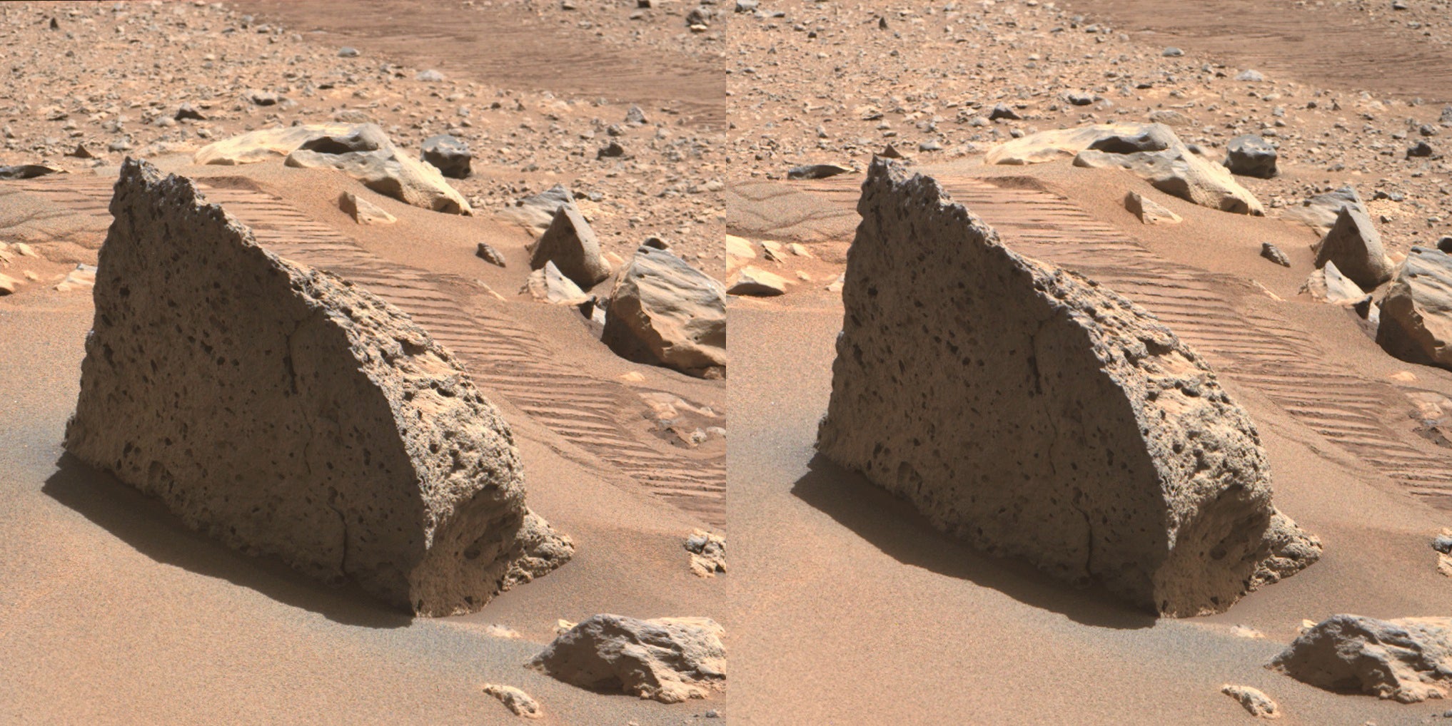 Perseverance’s wheel tracks stand out next to this sharp-edged rock. The magic of stereoscopy enables us to see that this spot stands on a small mount overlooking an expanse of rocks.