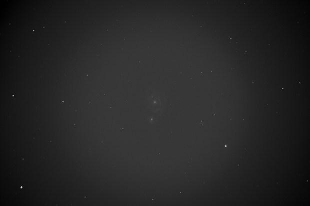 : An original, uncalibrated subframe of the Whirlpool Galaxy (M51). 