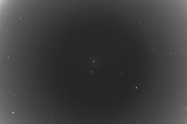 The same image of M51, calibrated with flats only, no darks (or flat darks). 