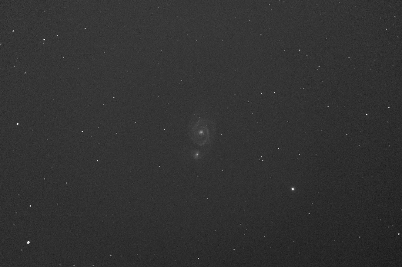 The image of M51 properly calibrated with flats and darks.