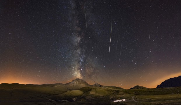 A stunning long-exposure photograph of the Perseid meteors 2023. The vertical Milky Way gives off the illusion that the inactive Mount Erciyes volcano, is active again! Credit: Kayseri Erciyes A.Ş. Ski Resort.