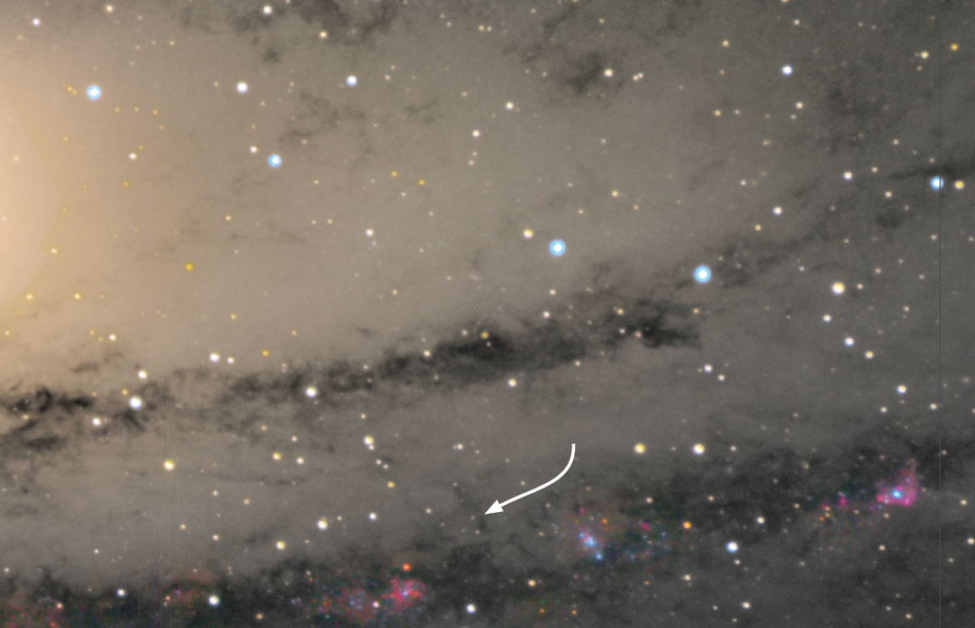This colorful image shows a closeup of a portion of the Andromeda Galaxy’s (M31) disk. The Cepheid variable star M31-V1 is indicated with an arrow.