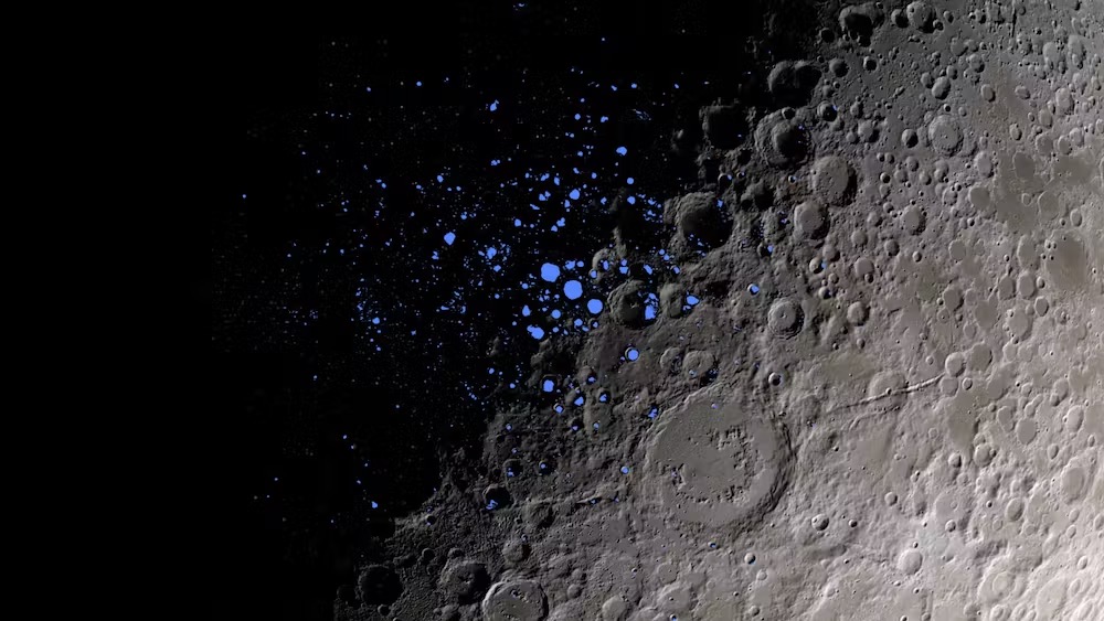 Some dark craters on the Moon, indicated here in blue, never get light. Scientists think some of these permanently shadowed regions could contain ice. NASA's Goddard Space Flight Center