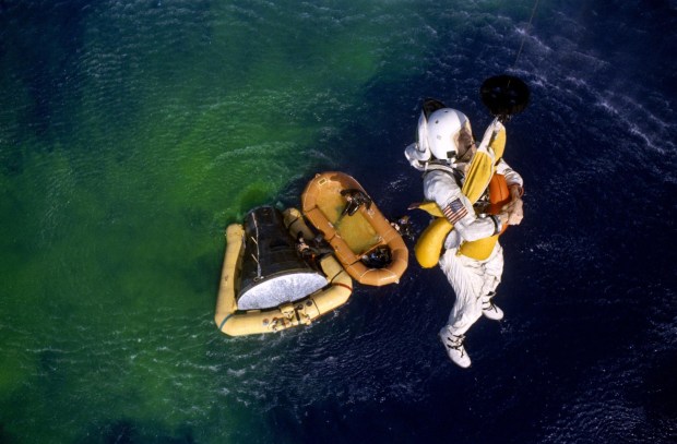 Frank Borman is hoisted from the water by a recovery helicopter from the aircraft carrier USS Wasp. Gemini-7 splashed down in the western Atlantic recovery area at 9:05 a.m. (EST), Dec. 18, 1965, to conclude the record-breaking mission in space. Astronaut James A. Lovell Jr. is the Gemini-7 pilot. Photo credit: NASA