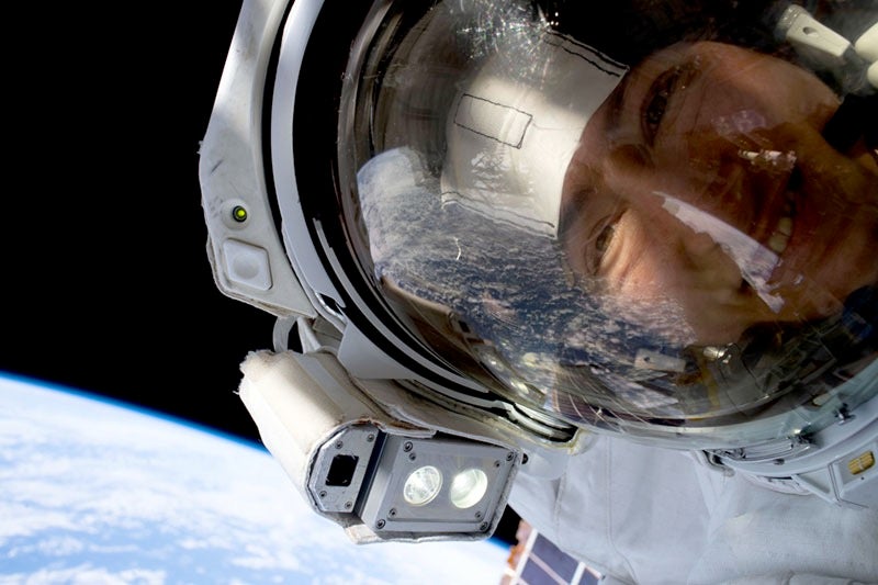 NASA astronaut Christina Koch stops for a picture while replacing equipment on the International Space Station. Credit: NASA