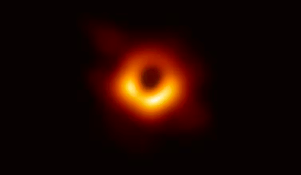 The first-ever image of a black hole was taken by the Event Horizon Telescope in 2019. You can see the light as it bends around the intense gravity of the black hole at the center of a galaxy called M87. It might look blurry, but this is the equivalent of being able to read a newspaper on a table in Paris if you were standing in New York. Event Horizon Telescope